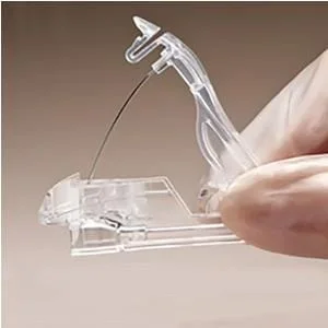 Baxter HuberLoc™ Huber Needle Removal and Containment Device
